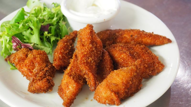 Classic Chicken Tenders golden crispy at Wings over